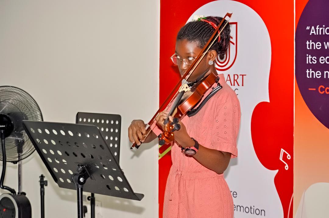 Young violinist performing
