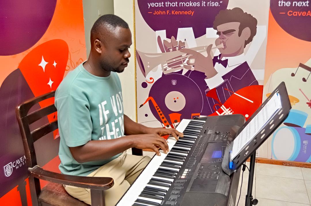 Instructor playing keyboard